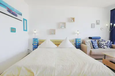 Ein Bett oder Betten in einem Zimmer der Unterkunft Trelleborgallee, Fewo 135