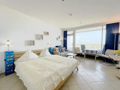 Ein Bett oder Betten in einem Zimmer der Unterkunft Trelleborgallee, Fewo 135