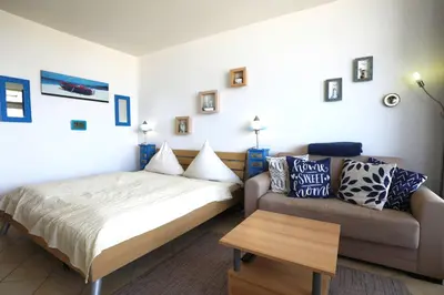 Ein Bett oder Betten in einem Zimmer der Unterkunft Trelleborgallee, Fewo 135
