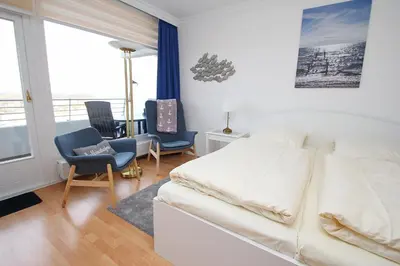 Ein Bett oder Betten in einem Zimmer der Unterkunft Trelleborgallee, Fewo 133