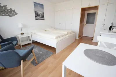 Ein Bett oder Betten in einem Zimmer der Unterkunft Trelleborgallee, Fewo 133