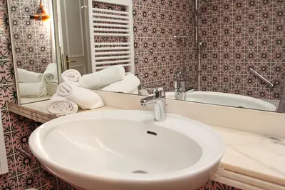 Ein Badezimmer in der Unterkunft Trelleborgallee, Fewo 133