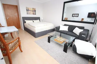Ein Bett oder Betten in einem Zimmer der Unterkunft Trelleborgallee, Fewo 127