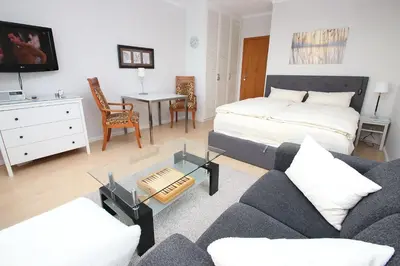 Ein Bett oder Betten in einem Zimmer der Unterkunft Trelleborgallee, Fewo 127