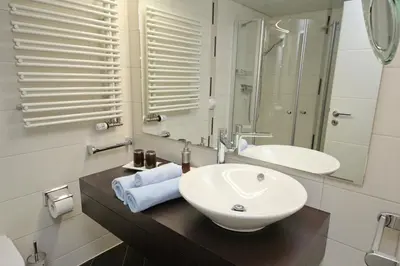 Ein Badezimmer in der Unterkunft Trelleborgallee, Fewo 128