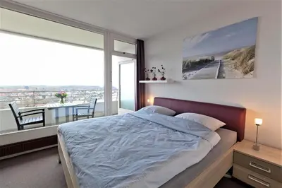 Ein Bett oder Betten in einem Zimmer der Unterkunft Trelleborgallee, Fewo 128