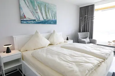Ein Bett oder Betten in einem Zimmer der Unterkunft Trelleborgallee, Fewo 123