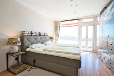 Ein Bett oder Betten in einem Zimmer der Unterkunft Trelleborgallee, Fewo 125