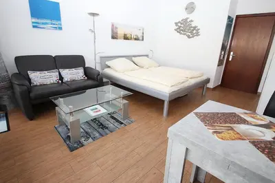 Ein Bett oder Betten in einem Zimmer der Unterkunft Trelleborgallee, Fewo 181