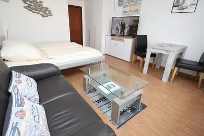 Ein Bett oder Betten in einem Zimmer der Unterkunft Trelleborgallee, Fewo 181