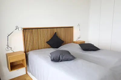 Ein Bett oder Betten in einem Zimmer der Unterkunft Trelleborgallee, Fewo 180