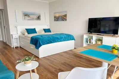 Ein Bett oder Betten in einem Zimmer der Unterkunft Trelleborgallee, Fewo 179