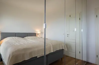 Ein Bett oder Betten in einem Zimmer der Unterkunft Trelleborgallee, Fewo 174