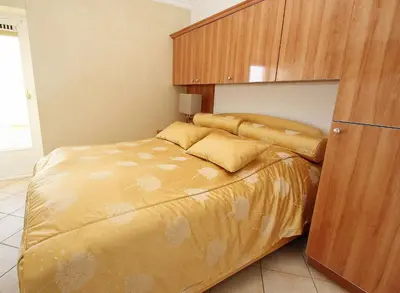 Ein Bett oder Betten in einem Zimmer der Unterkunft Trelleborgallee, Fewo 153