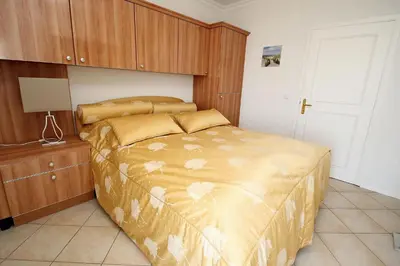 Ein Bett oder Betten in einem Zimmer der Unterkunft Trelleborgallee, Fewo 153