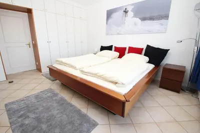 Ein Bett oder Betten in einem Zimmer der Unterkunft Trelleborgallee, Fewo 153