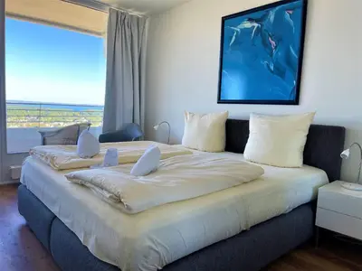 Ein Bett oder Betten in einem Zimmer der Unterkunft Trelleborgallee, Fewo 152