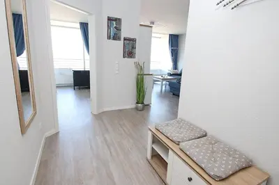 Ein Bett oder Betten in einem Zimmer der Unterkunft Trelleborgallee, Fewo 156