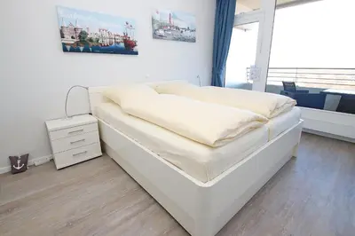 Ein Bett oder Betten in einem Zimmer der Unterkunft Trelleborgallee, Fewo 156
