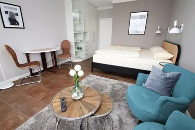 Ein Bett oder Betten in einem Zimmer der Unterkunft Trelleborgallee, Fewo 150