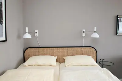 Ein Bett oder Betten in einem Zimmer der Unterkunft Trelleborgallee, Fewo 150