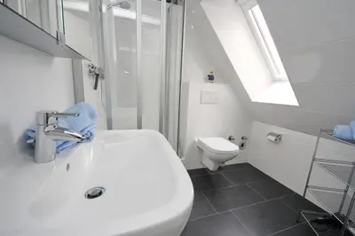 Ein Badezimmer in der Unterkunft Vorderreihe, Fewo 107