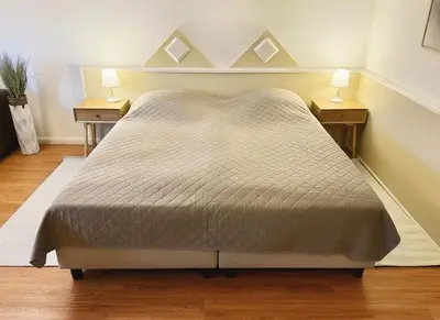 Ein Bett oder Betten in einem Zimmer der Unterkunft Villa Miramare, Fewo 101