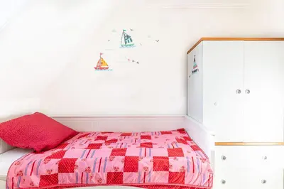 Ein Bett oder Betten in einem Zimmer der Unterkunft Villa Miramare, Fewo 213