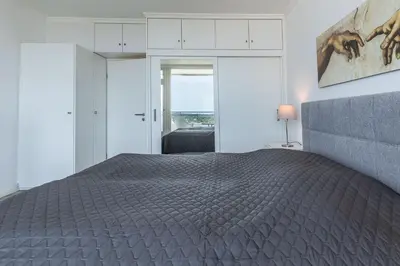 Ein Bett oder Betten in einem Zimmer der Unterkunft Trelleborgallee, Fewo 212