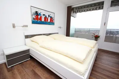 Ein Bett oder Betten in einem Zimmer der Unterkunft Trelleborgallee, Fewo 209