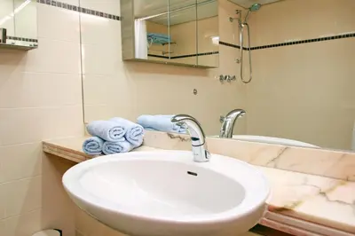 Ein Badezimmer in der Unterkunft Trelleborgallee, Fewo 208