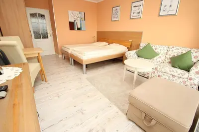 Ein Bett oder Betten in einem Zimmer der Unterkunft Trelleborgallee, Fewo 199