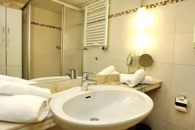 Ein Badezimmer in der Unterkunft Trelleborgallee, Fewo 199