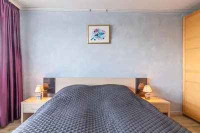 Ein Bett oder Betten in einem Zimmer der Unterkunft Trelleborgallee, Fewo 197