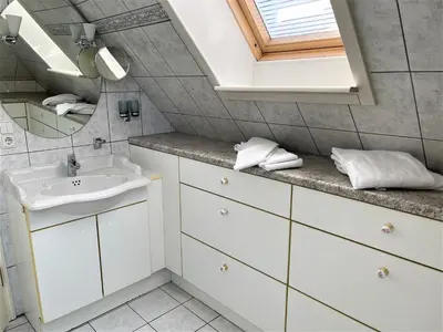 Ein Badezimmer in der Unterkunft Vorderreihe, Fewo 210