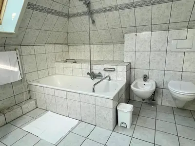 Ein Badezimmer in der Unterkunft Vorderreihe, Fewo 210