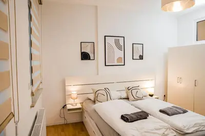 Ein Bett oder Betten in einem Zimmer der Unterkunft DP Homes