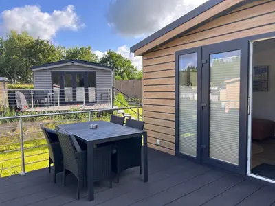Ein Balkon oder eine Terrasse in der Unterkunft Ostseecamp Ferienhaus Küstenklang
