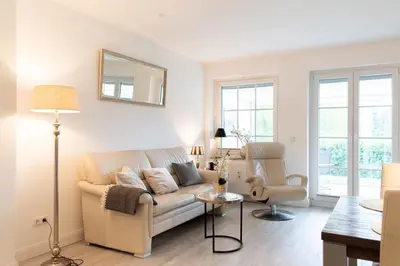 Ein Sitzbereich in der Unterkunft Ferienwohnung Boje 1 - Timmendorfer Strand