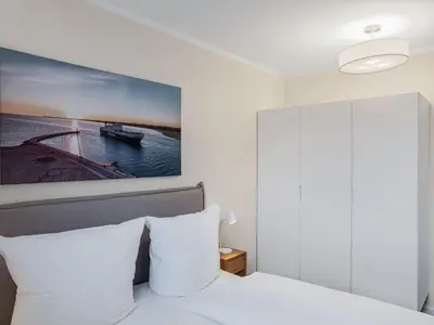 Ein Bett oder Betten in einem Zimmer der Unterkunft Objekt-Nr 171 - Strand - Kaiserallee