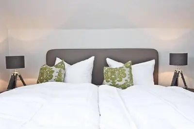 Ein Bett oder Betten in einem Zimmer der Unterkunft Apartment Ostseerausch