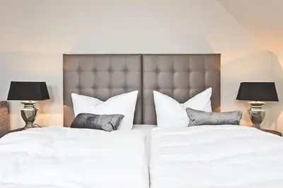 Ein Bett oder Betten in einem Zimmer der Unterkunft Apartment Ostseerausch