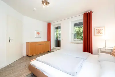 Ein Bett oder Betten in einem Zimmer der Unterkunft Ferienwohnung 