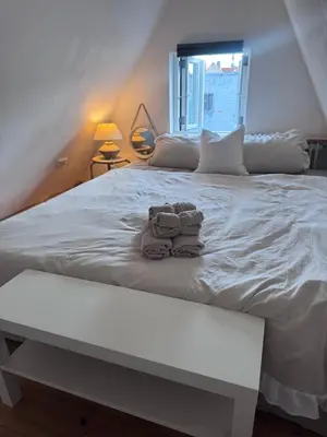 Ein Bett oder Betten in einem Zimmer der Unterkunft Altstadthaus No 18