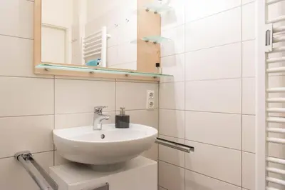 Ein Badezimmer in der Unterkunft Ferienwohnung Sunrise 54° - Timmendorfer Strand