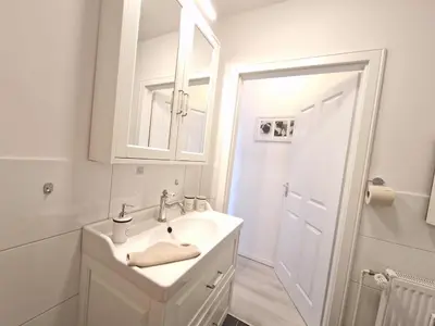 Ein Badezimmer in der Unterkunft Berliner Hof App. 109