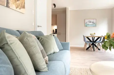 Ein Sitzbereich in der Unterkunft Ferienwohnung Villa Heidenreich Nr.4 - Scharbeutz