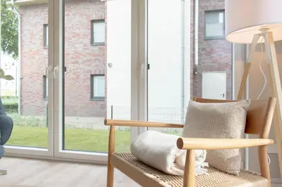 Ein Sitzbereich in der Unterkunft Ferienwohnung Villa Heidenreich Nr.2 - Scharbeutz