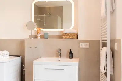 Ein Badezimmer in der Unterkunft Ferienwohnung Villa Heidenreich Nr.5 - Scharbeutz