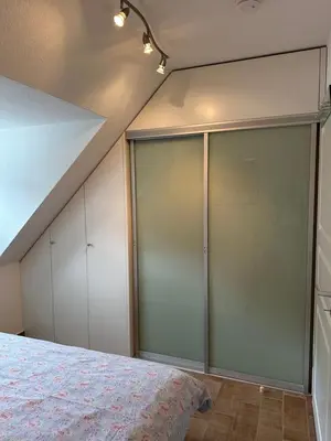 Ein Bett oder Betten in einem Zimmer der Unterkunft Eastside am Kurpark